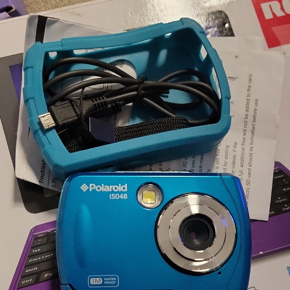 Polaroid iS048 Blue Digital Point-and-Shoot Camera with Blue Silicone Case